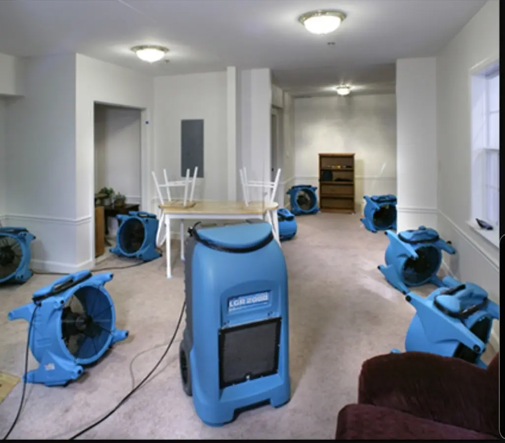 Air movers and dehumidifier setup for Water Damage Restoration in Green Bay